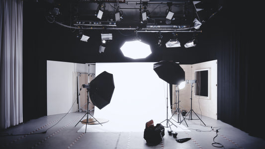 Lights and reflectors surrounding a bright photo studio