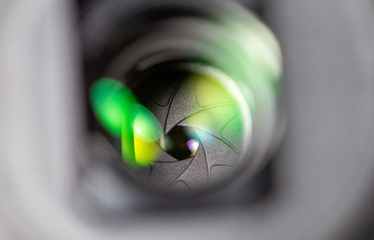 A closeup of the aperture of a camera lens